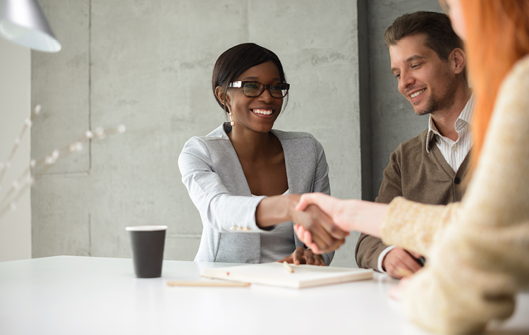 Business woman greeting partner