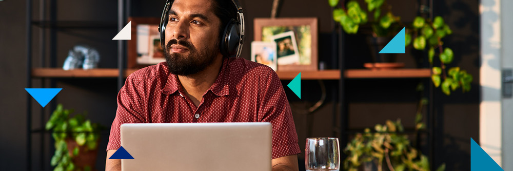 Man upskilling from home on his laptop